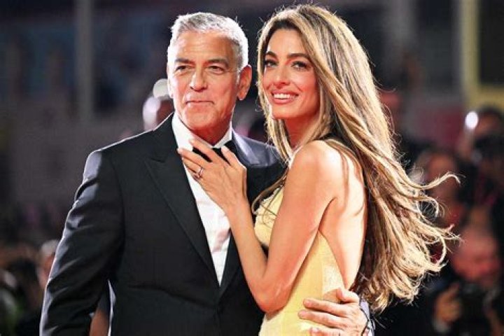 Does george clooney have a butterfly tattoo