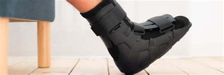 How long to wear a walking boot for sprained ankle