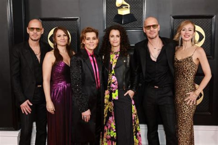 Who are the twins that sing with Brandi Carlile?